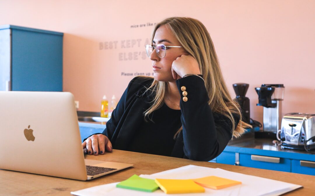 woman staring at her computer